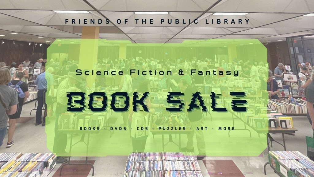 Crowded public library room hosting a science fiction and fantasy book sale with tables full of books and other media.